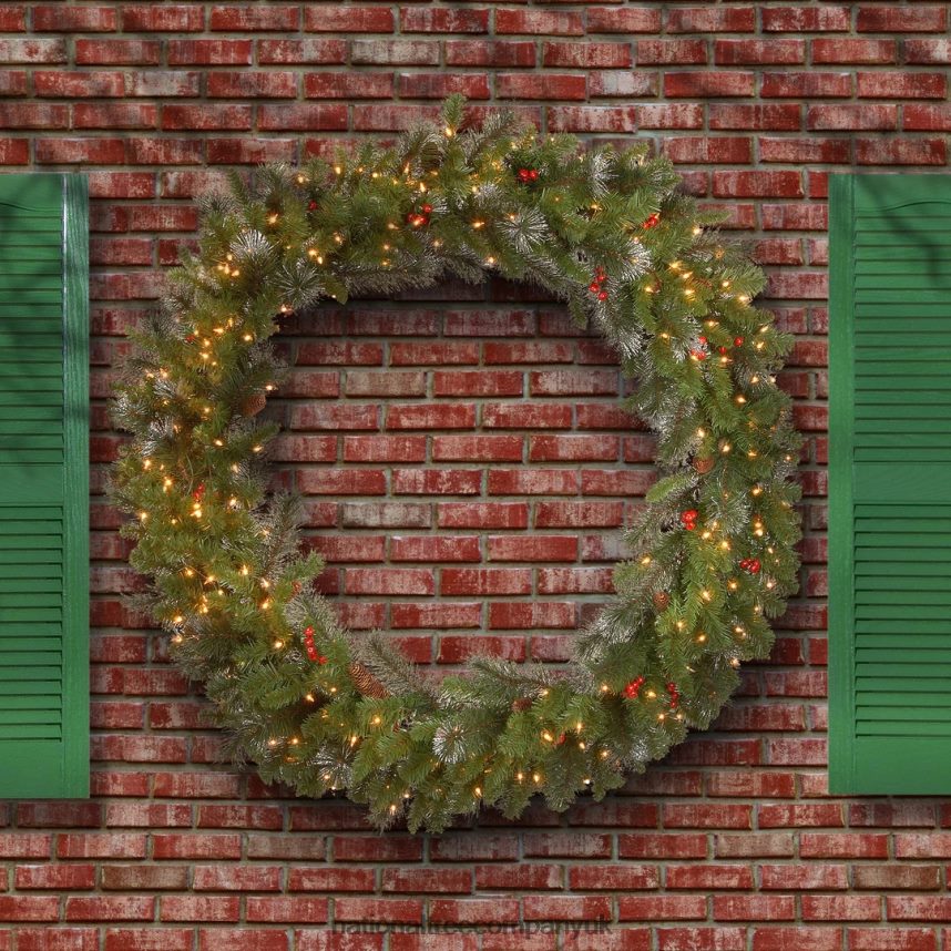 Greenery | National Tree Company Pre-Lit Artificial Christmas Wreath Green Crestwood Spruce White Lights Decorated with Pine Cones Berry Clusters Christmas Collection 48 Inches F2L4F285